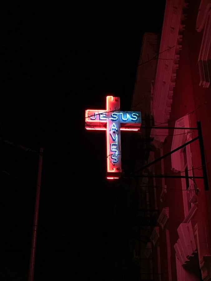 jesus saves neon signage